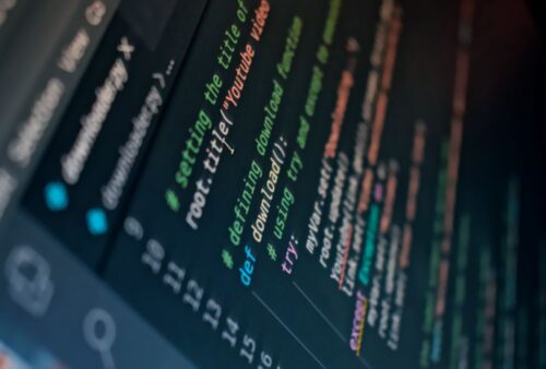 Close-up of colourful lines of code on a computer screen