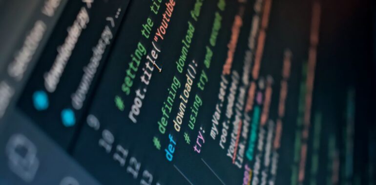 Close-up of colourful lines of code on a computer screen